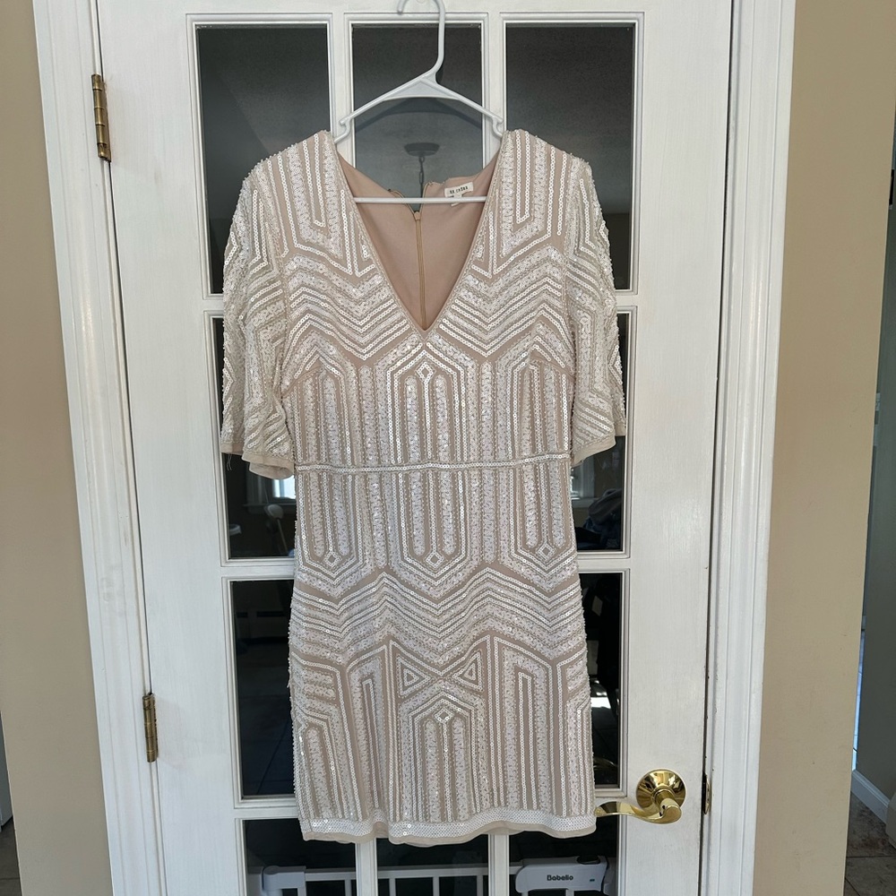 White beated dress